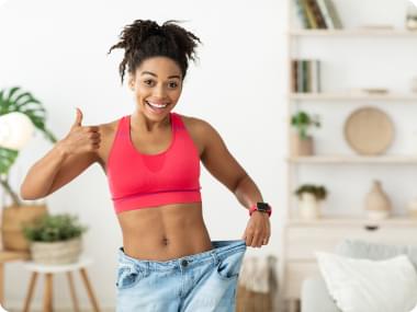 Fit Woman In Old Jeans.