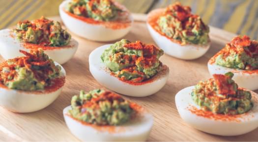 Spicy Guacamole Deviled Eggs.